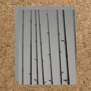 Fishing Rods aligned on Grey Scrapbook Paper