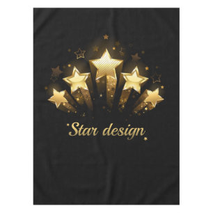 Five gold stars on black tablecloth