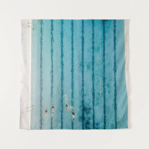 Five people swimming on pool tapestry