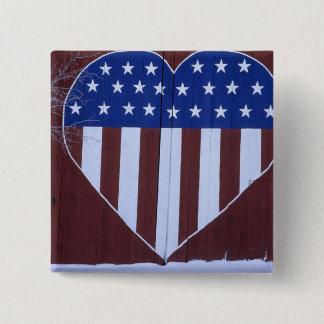 Flag in heart shape painted on barn after 9-11. 2 inch square button