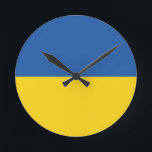 Flag of Ukraine Button Round Clock<br><div class="desc">The flag of Ukraine is a banner of two equally sized horizontal bands of blue and yellow. The top represents sky and the yellow represents wheat. 
 The National Flag of Ukraine</div>