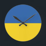 Flag of Ukraine Button Round Clock<br><div class="desc">The flag of Ukraine is a banner of two equally sized horizontal bands of blue and yellow. The top represents sky and the yellow represents wheat. 
 The National Flag of Ukraine</div>