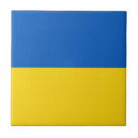 Flag of Ukraine Tile<br><div class="desc">Flag of Ukraine: The colors are associated with the Ukrainian landscape,  the horizontal blue and yellow strips symbolize the blue sky on the wheat fields.</div>