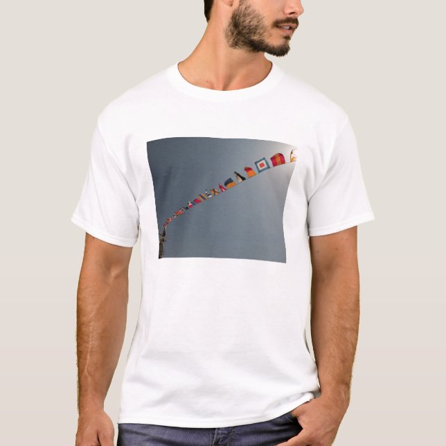 Flags fly over the deck of the USS Iwo Jima T-Shirt (Front)