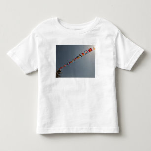 Flags fly over the deck of the USS Iwo Jima Toddler T-shirt