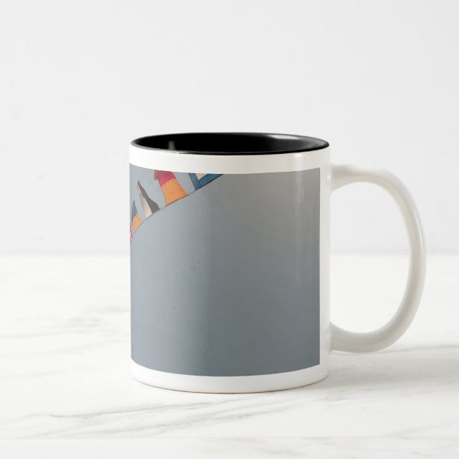 Flags fly over the deck of the USS Iwo Jima Two-Tone Coffee Mug (Right)