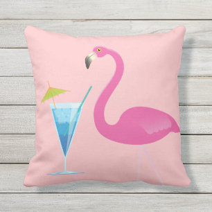 Flamant rose et cocktail sur le coussin extérieur