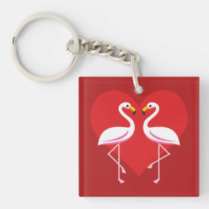 Flamants roses blancs mignons rose avec coeur roug