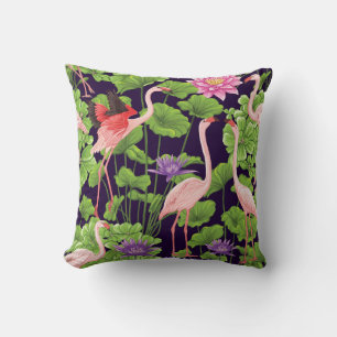 Flamingo, tropical plants, black background. throw pillow