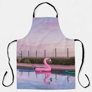 Flamingo water floater in swimming pool apron