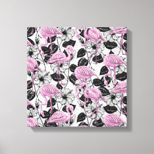 Flamingos and hibiscus flowers canvas print