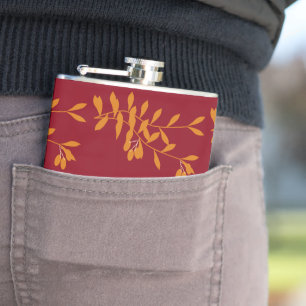 Flasques Feuilles de branches de silhouette orange sur roug