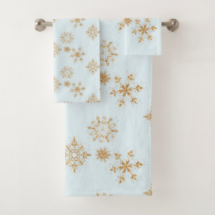 Flèche de neige en or sur Motif de Noël bleu givré