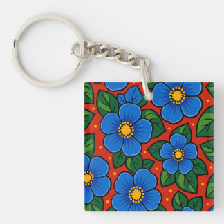 Fleurs bleues et feuilles vertes sur fond rouge