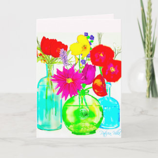 Fleurs colorées sur carte de note vierge