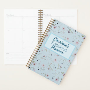 Fleurs colorées sur le planificateur personnalisé