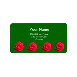 fleurs de camélia rouges étiquette d'adresse verte