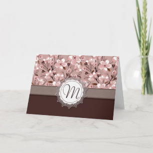 Fleurs de cerisier avec le monogramme de dentelle