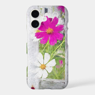 Fleurs de cosmos roses et blanches avec clôture