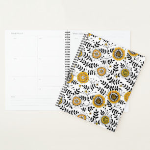 Fleurs de gribouillis et feuilles en jaune et noir