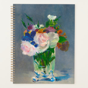 Fleurs de manet dans un vase de cristal