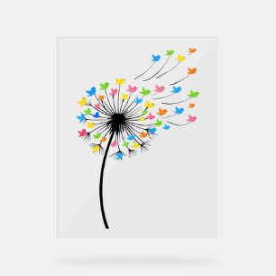 Fleurs de pissenlit en vol d'oiseaux colorés