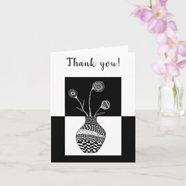 Fleurs noires et blanches dans une carte de voeux  (Orchidée)