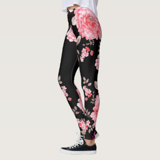 Fleurs roses avec legging arrière - plan noir.