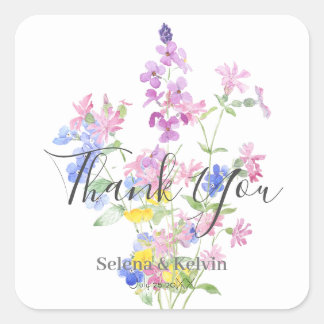 fleurs sauvages rose bleu jaune rond autocollant