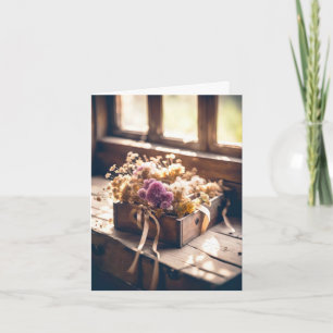 Fleurs séchées dans une boîte en bois