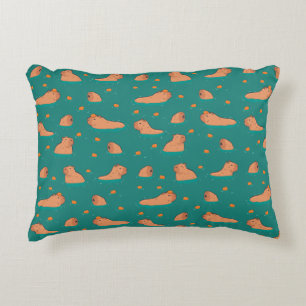 floating capybaras with orange accent pillow