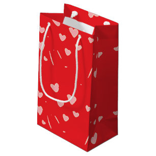 Floating pink hearts on red small gift bag