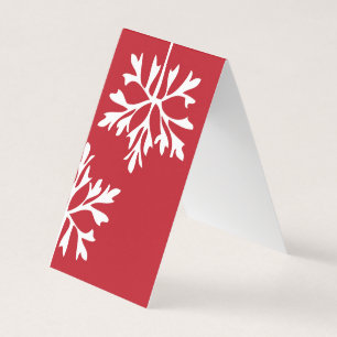 Flocon de neige simple sur l'arrière - plan rouge