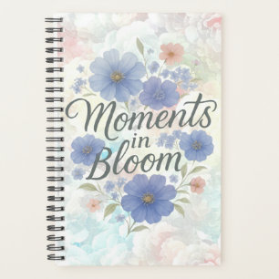 Floral artwork with “Moments in Bloom” Planner