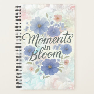 Floral artwork with “Moments in Bloom” Planner