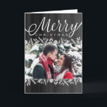 Floral & Berries Chalkboard Merry Christmas Photo Holiday Card<br><div class="desc">This elegant photo Christmas card features white accents of poinsettias, pine cones and pine branches with touches of red berries, all on a chalkboard background. Get "oohs and aahs" from family and friends this Christmas season when you send a unique and trendy greeting from DoodleLulu by 2 june bugs design!...</div>