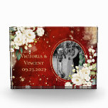 Floral Gold Red Cream Names Wedding Photo Block<br><div class="desc">Gorgeous white botanical floral spray on vintage scarlet red with faux gold splotches. The red antique watercolor rustic background is such a rich classy look mixed with the cream coloured flowers is lovely. Personalize with photo, names and wedding date. This is a lovely keepsake for the newlyweds. Beautiful faux gold...</div>