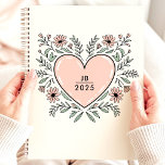 Floral Heart 2025 Monogram Planner<br><div class="desc">Embrace love and organization with this charming planner featuring a heart-shaped floral design. Personalize it with your monogram for a unique and heartfelt touch. This planner is perfect for keeping track of appointments, to-dos, and all your important dates throughout 2025. With its lovely design and ample writing space, it's a...</div>