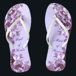 Floral Lilac Flowers Wedding Maid of Honour Flip Flops<br><div class="desc">Lilacs are the theme of these elegant floral Maid of Honour wedding flip flops with pink and mauve lilac flowers on a purple background.  The text can be customized for your special occasion.</div>