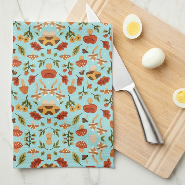 Floral pattern blanket with a light blue backgroun kitchen towel (Creator Uploaded)
