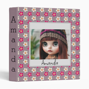 Floral pattern of crimson and white flowers on a c binder