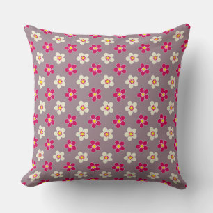 Floral pattern of crimson and white flowers on a c throw pillow