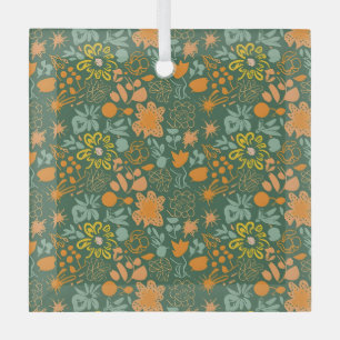Floral pattern on a dark green background glass ornament