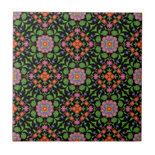Floral Rangoli Pattern on Black Ceramic Tile
