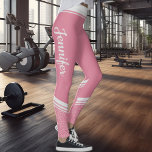 Floral striped modern girly pink with name leggings<br><div class="desc">These pink stylish workout leggings feature an elegant white floral design on the waistband and on the ankles and calves and white stripes on the waistband.
Easily customizable by adding your name on both sides on a calligraphy white font.</div>