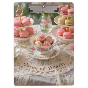 Floral table, teacups, tiered trays macarons queen clipboard
