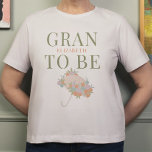Floral Umbrella GRAN TO BE TEXT BACK Baby Shower T-Shirt<br><div class="desc">***this design is part of a baby shower collection*** Delight your baby shower guests from the start with my Floral Umbrella Neutral Unisex Baby Shower Collection! My customizable templates bring a touch of whimsy and elegance to any baby shower party. The gender-neutral design, accentuated by beautiful muted pastel colours, makes...</div>