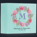 Floral Watercolor Wreath Monogram Wedding Binder<br><div class="desc">Personalize with your monogram initial, bride and groom's name and wedding date. Makes a perfect wedding planner or photo album. The design is a beautiful botanical themed illustration with a circular wreath of pretty watercolor flowers in pink and purple with green leaves in between. The floral design is made up...</div>