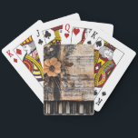 Floral with Rustic Piano Keys & Aged Music Sheet 2 Playing Cards<br><div class="desc">This evocative playing card blends the beauty of a delicate flower with the nostalgic charm of rustic piano keys and a weathered music sheet background. With warm brown tones and aged paper textures, it captures the romance of forgotten melodies and timeless artistry. Perfect for music lovers, vintage collectors, and anyone...</div>