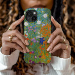 Flower Garden | Gustav Klimt iPhone 15 Case<br><div class="desc">Flower Garden (1905-1907) by Austrian artist Gustav Klimt. Original fine art painting is oil on canvas featuring a bright abstract landscape of colourful flowers. 

Use the design tools to add custom text or personalize the image.</div>